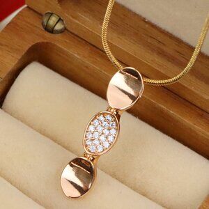 "Rose Gold Pendant with Sparkling Center, Elegant Gold-Plated Design, XPPT1602